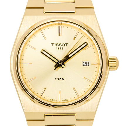 Reloj Tissot PRX de acero inoxidable dorado con esfera color champán, cuarzo suizo T137.210.33.021.00, 100 m, para mujer